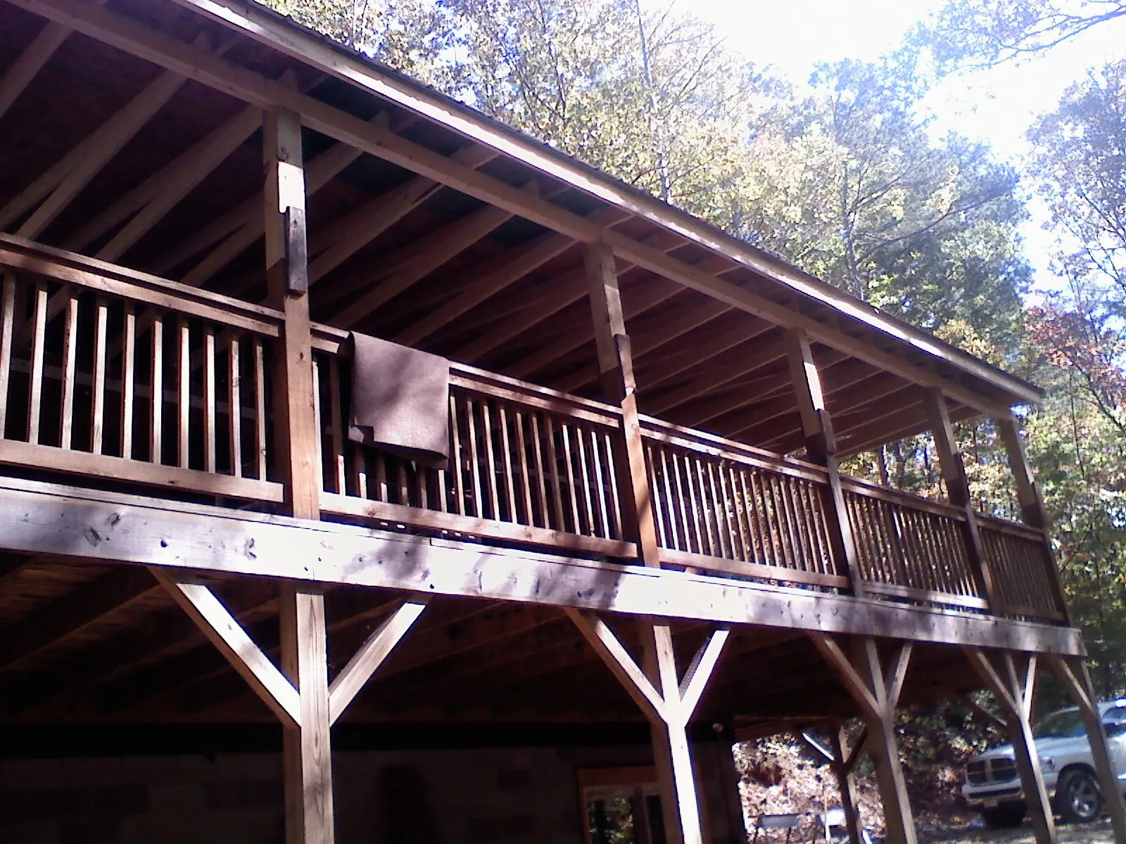 Timber framing under a new elevated porch and deck — Roof Leak Repair in Placida by Roofing Brothers